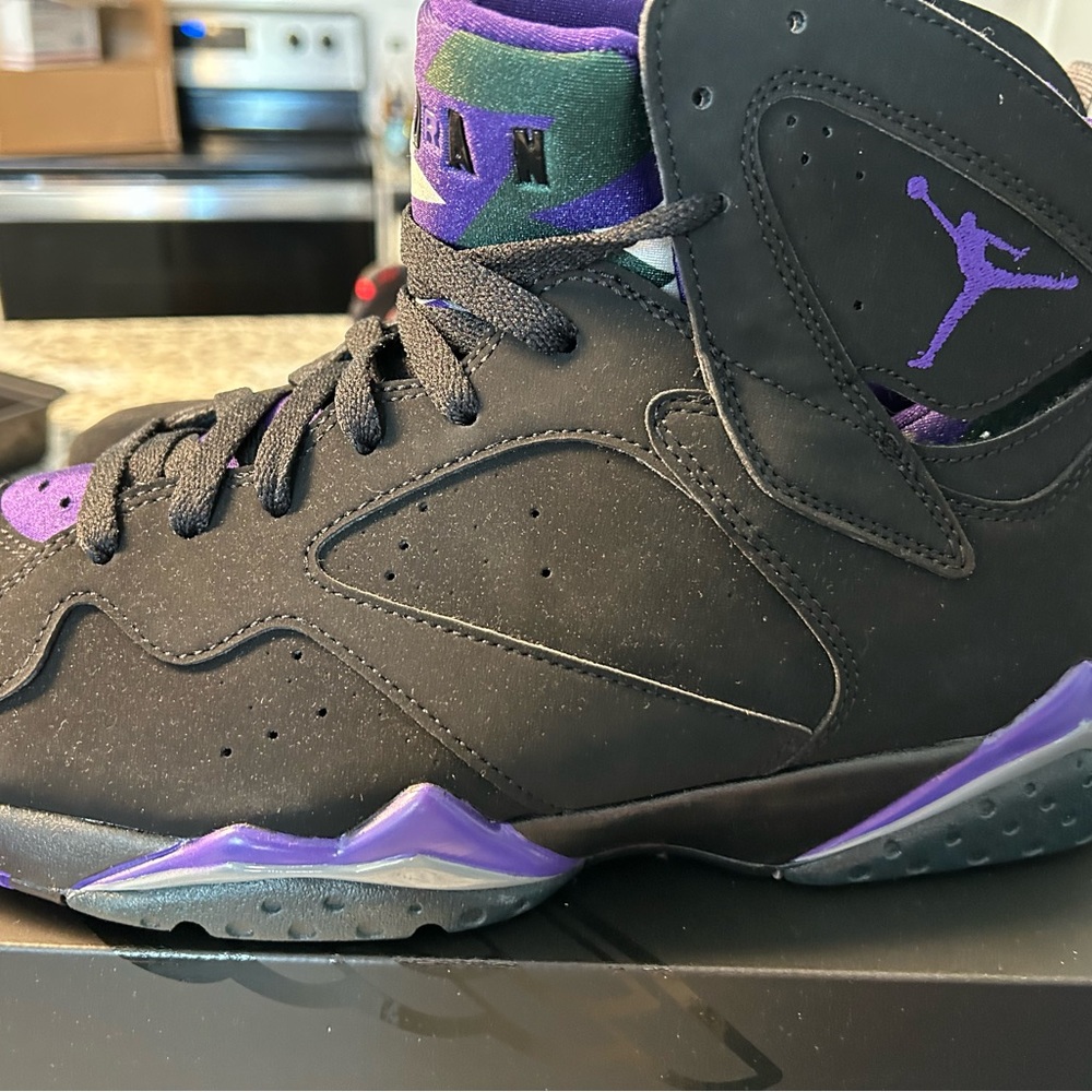 Brand new, never worn, Air Jordans Black, Purple, Grey. Size 11